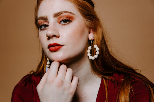 woman in red lipstick and red lipstick