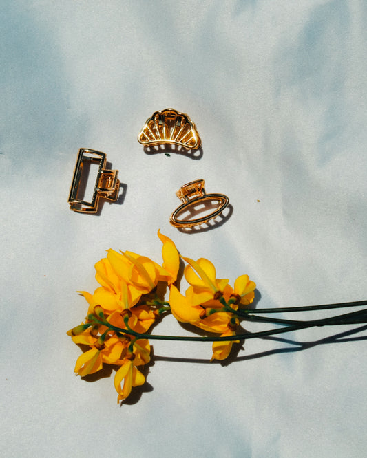 a bunch of yellow flowers sitting on top of a table