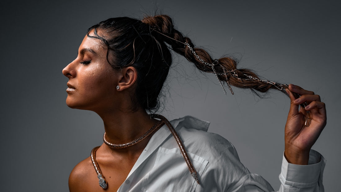 a woman with her hair blowing in the wind