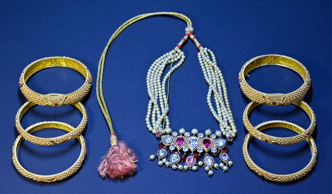 A collection of jewelry including bracelets and rings