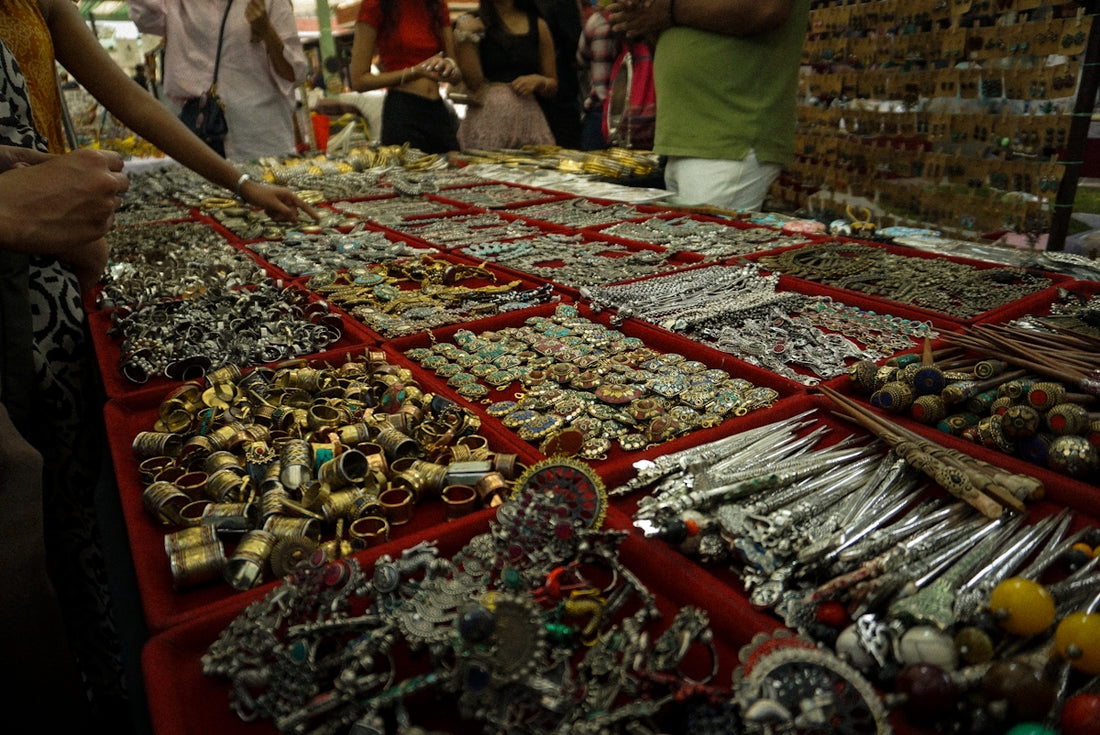 Table full of assorted jewelry and accessories